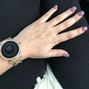 Rose gold Michael Kors smart watch